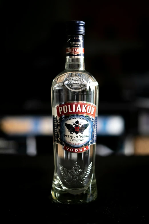 a bottle of polishow vodka on a table