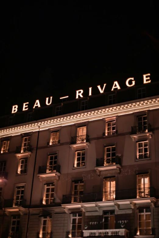 a building lit up in the dark at night