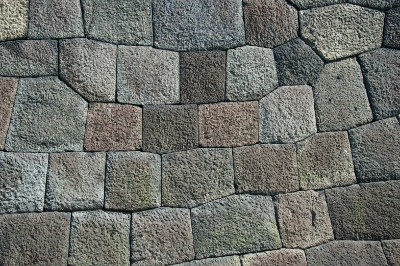 a cement wall that looks like it has been made from rocks