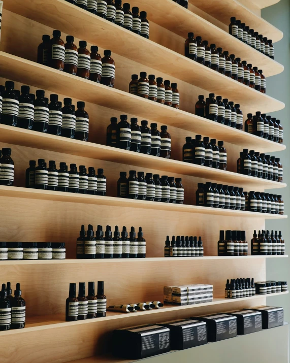 several bottles of hair product on a shelf