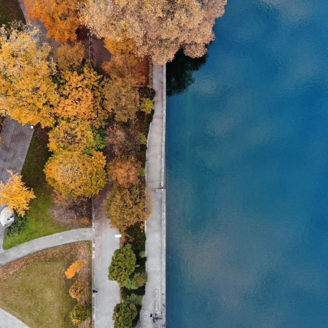 an aerial view of an area with blue water