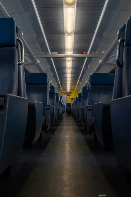 inside of a commuter train cabin with no people