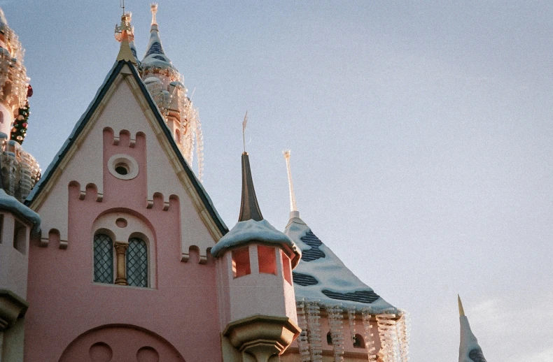 the pink palace sits near a few buildings