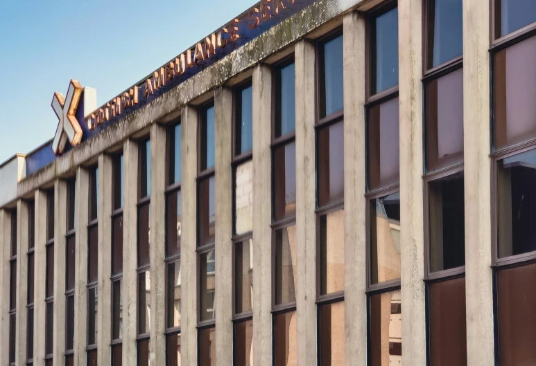 the entrance to the building has glass on the side