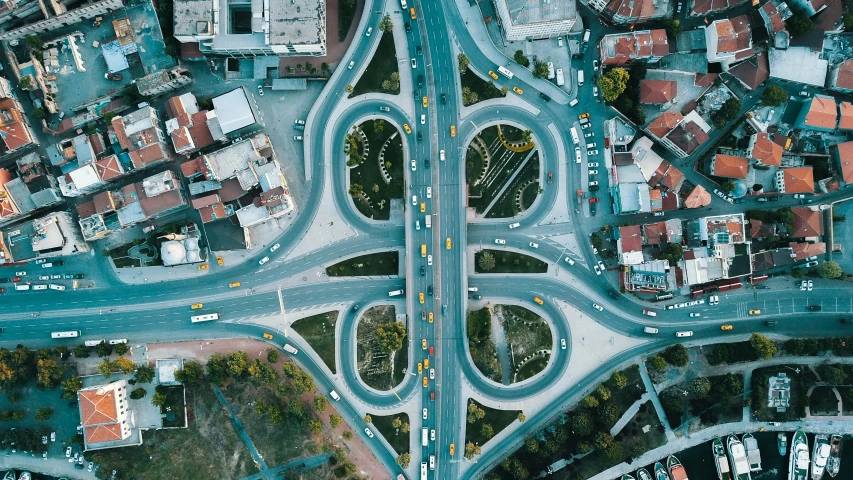 an aerial s shows two intersection roads in a city