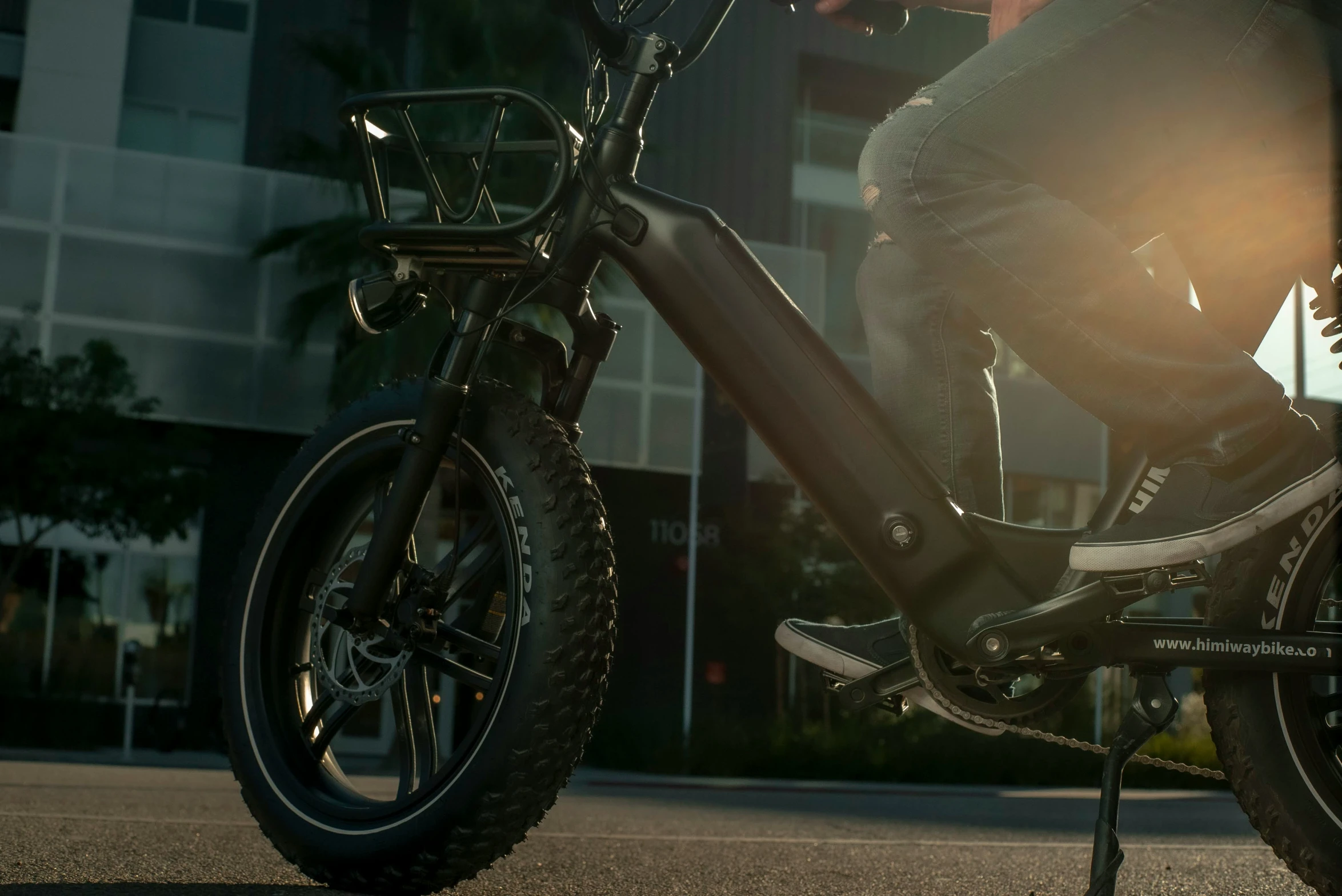 a man riding a motorcycle on a sunny day