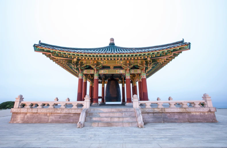 the architecture of an oriental pagoda on display at a park