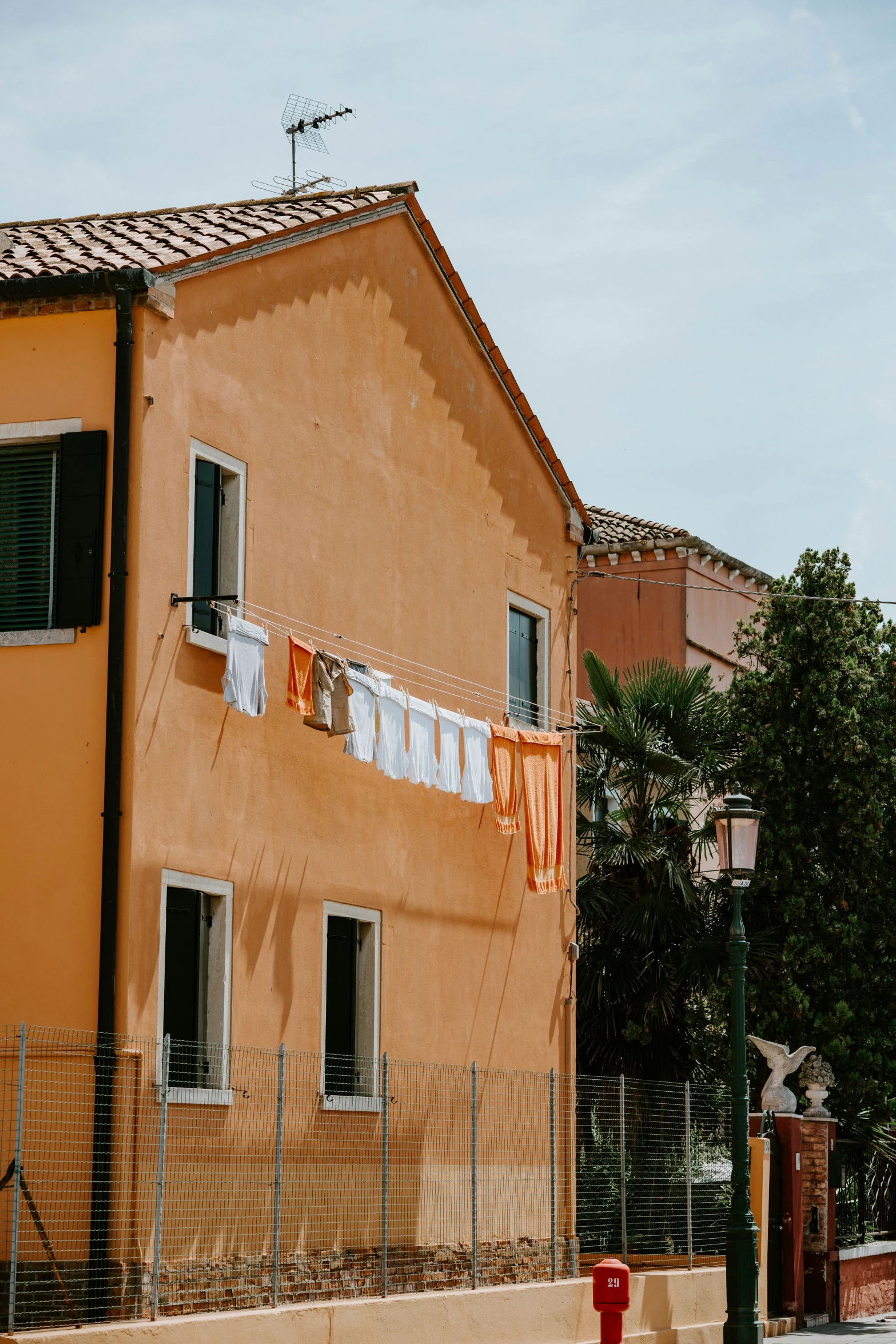 a picture of the facade of an orange house