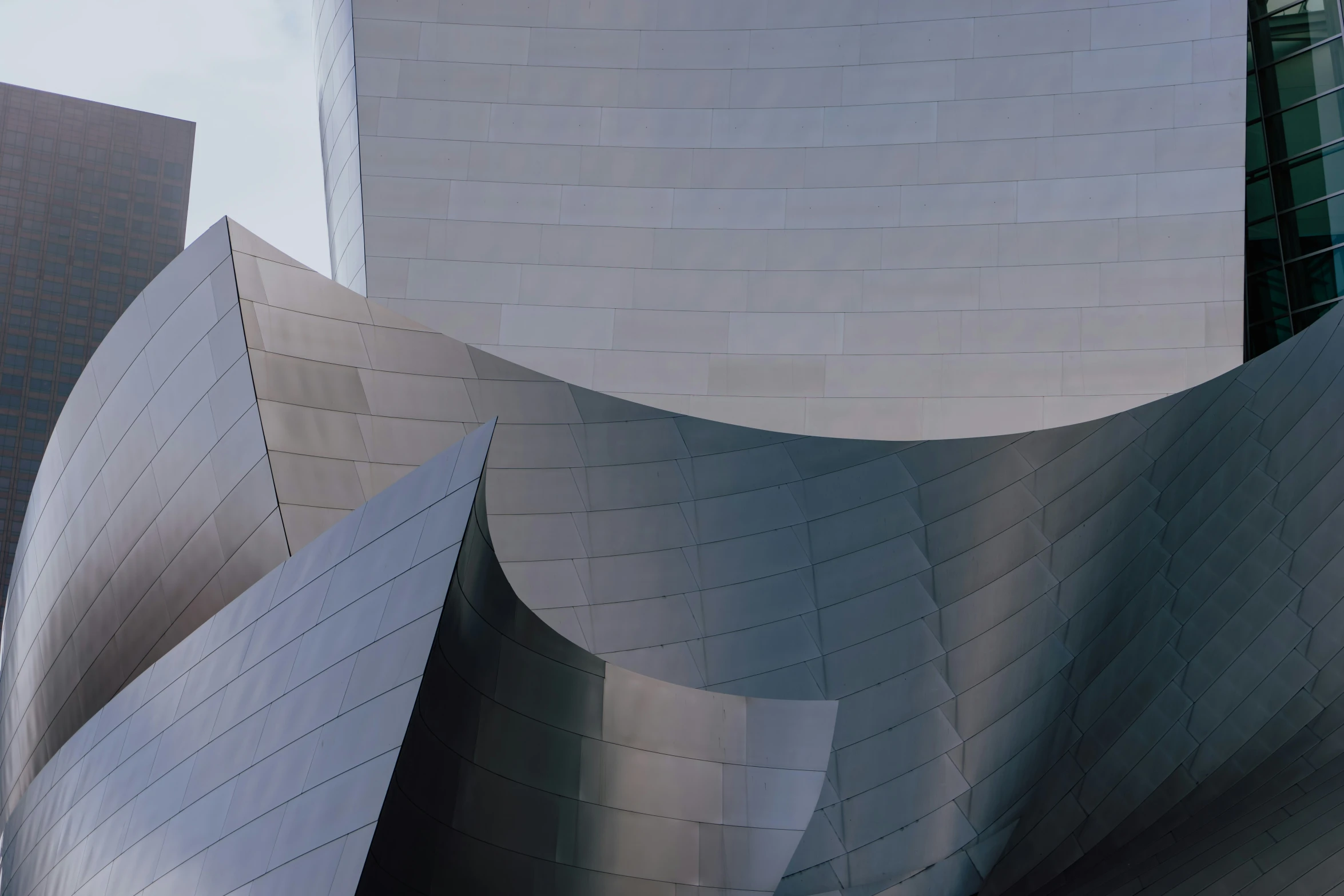 a view of a building with a very large curved window