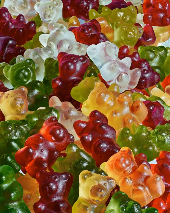 many gummy bears are being made with different colors