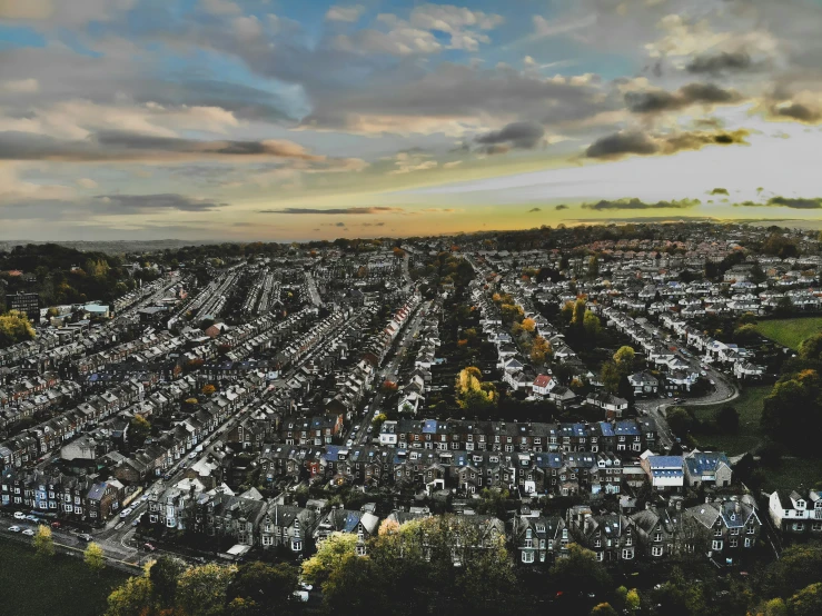 aerial pograph looking at city during sunset