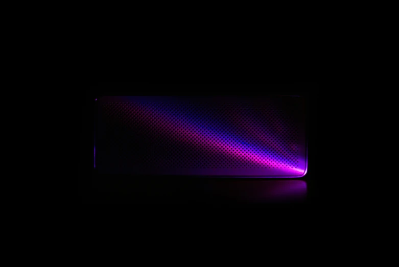 a mouse pad is shown lit up in the dark