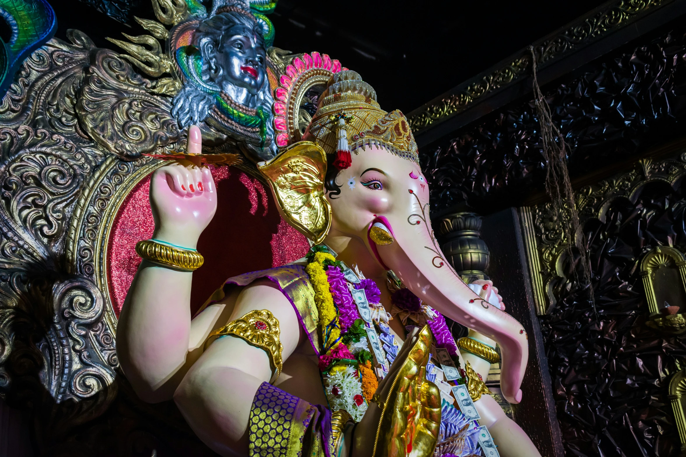 a statue of an elephant on display inside a shop