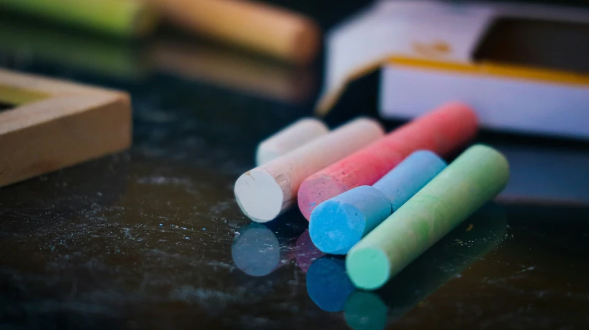 colorful chalk sticks lined up in a row