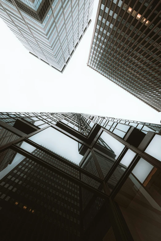 looking up at buildings and sky from below