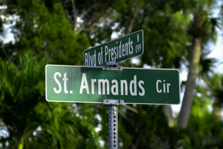 a street sign for st commands street and streets
