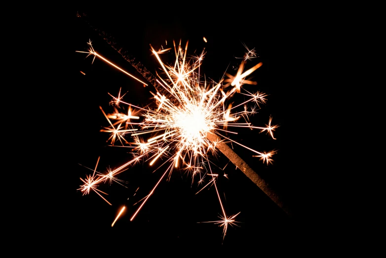 a fireworks that is in the dark with it's sparks