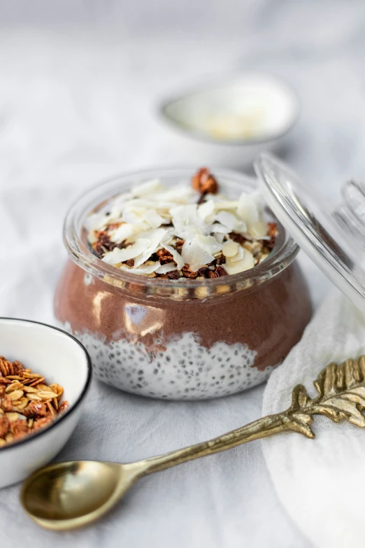 some oatmeal that is in a bowl on top of some plates