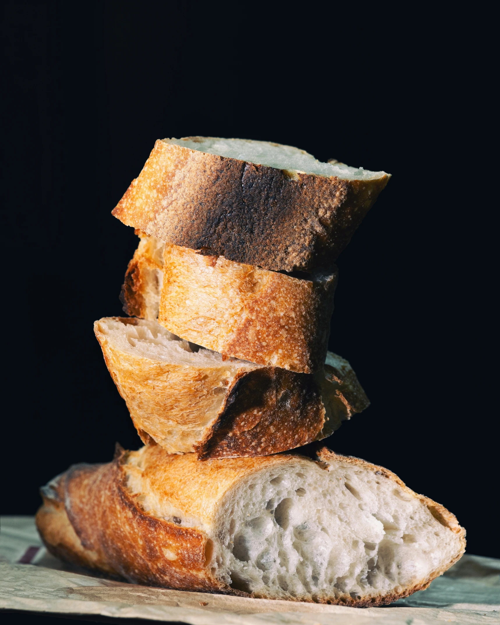 a stack of bread on top of a  board