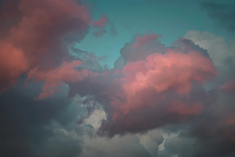 the clouds are in color at sunset