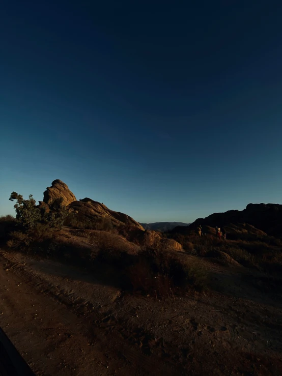 the view of the mountain from a vehicle on the road