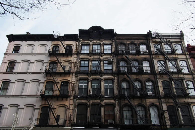 a building with several balconies has many windows