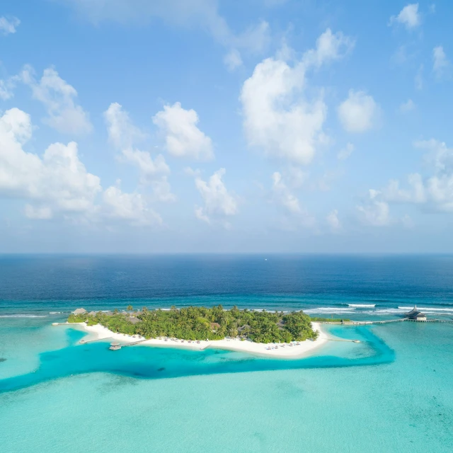 a deserted island is surrounded by water and sand