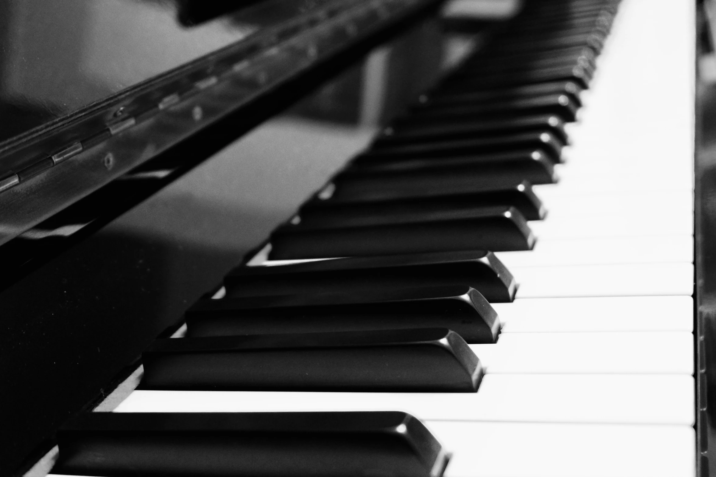 black and white pograph of a piano