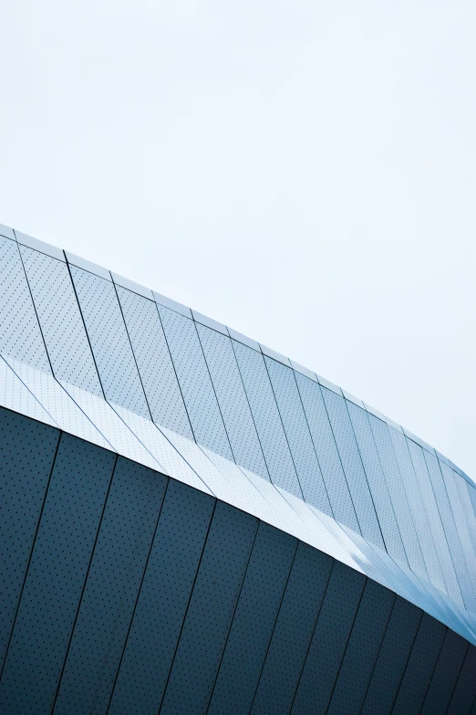 an airplane is flying over a building