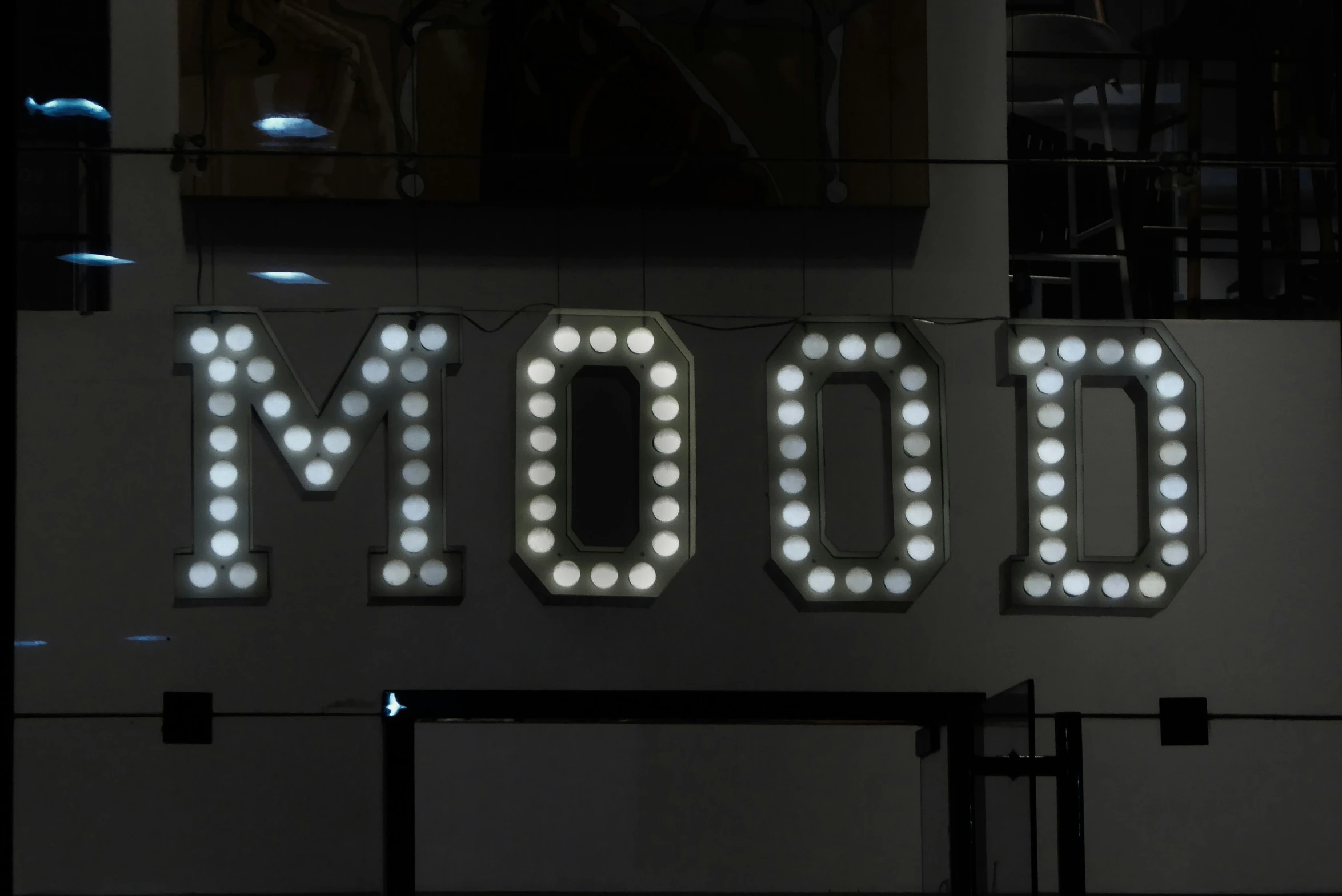 a large led sign reads mood on it's sides