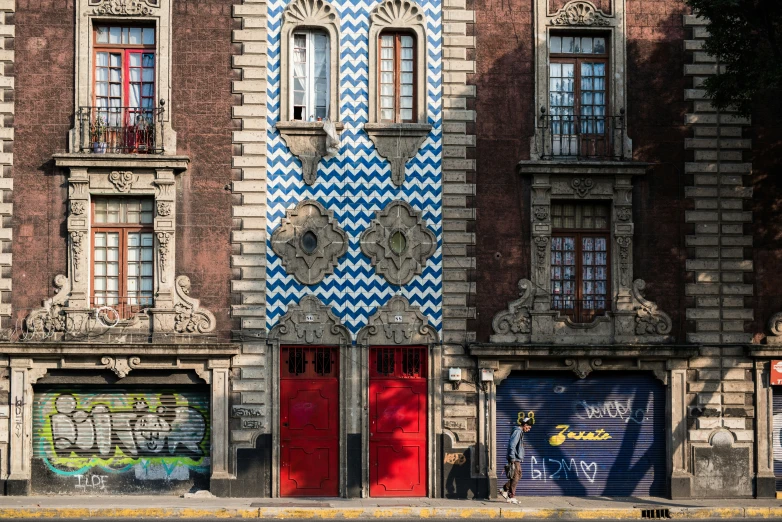 a colorful building with doors and windows painted like numbers