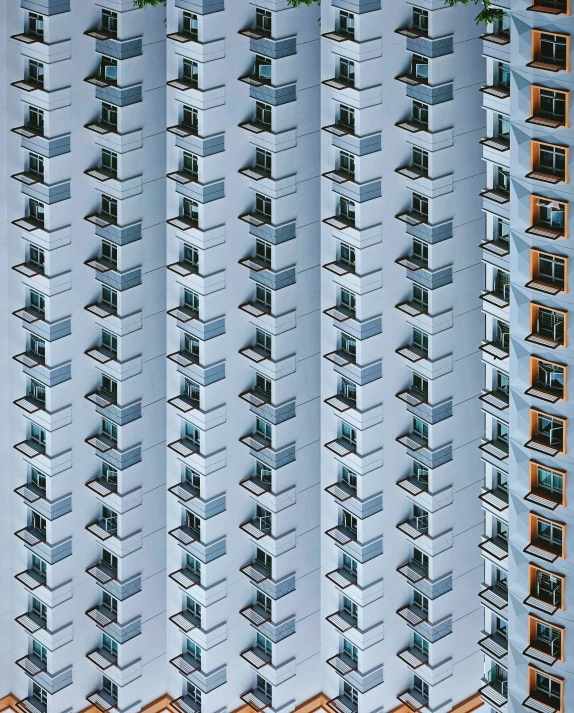an image of a very tall building with some windows