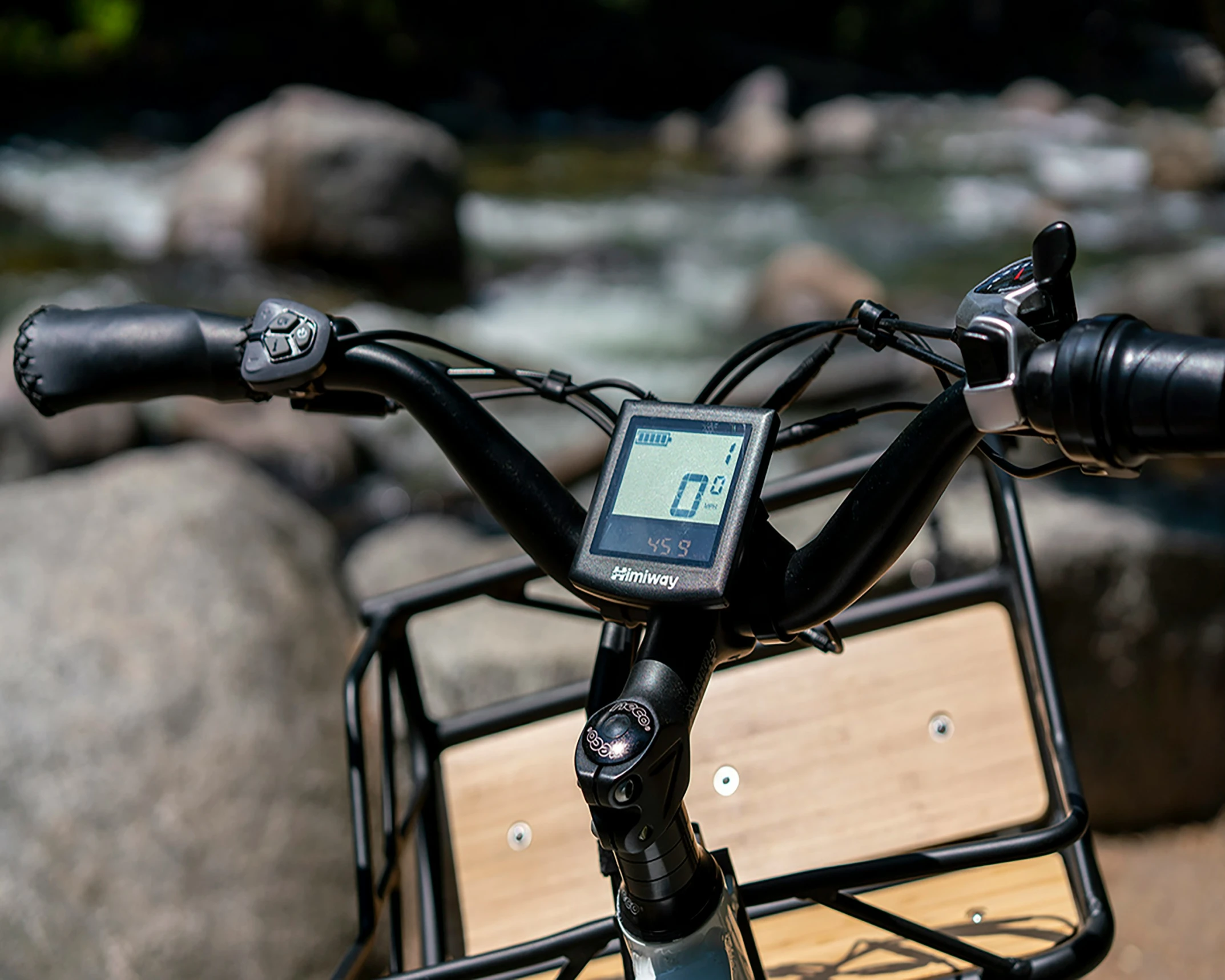 a bike that is standing next to a river