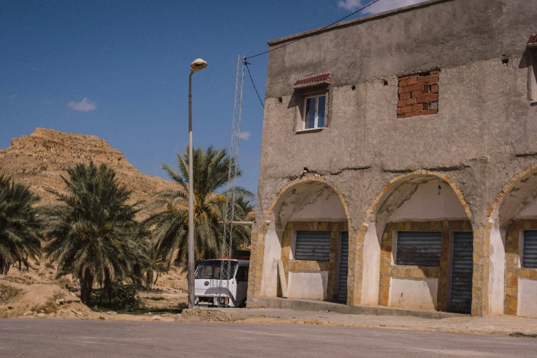 an old truck parked in front of a building