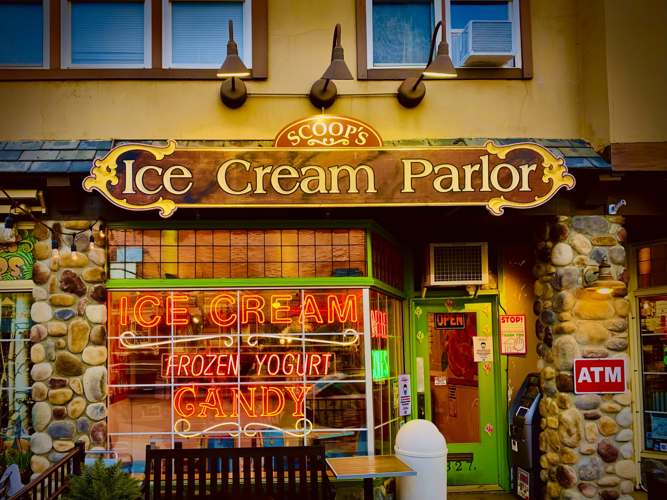 an ice cream parlor is seen with signage