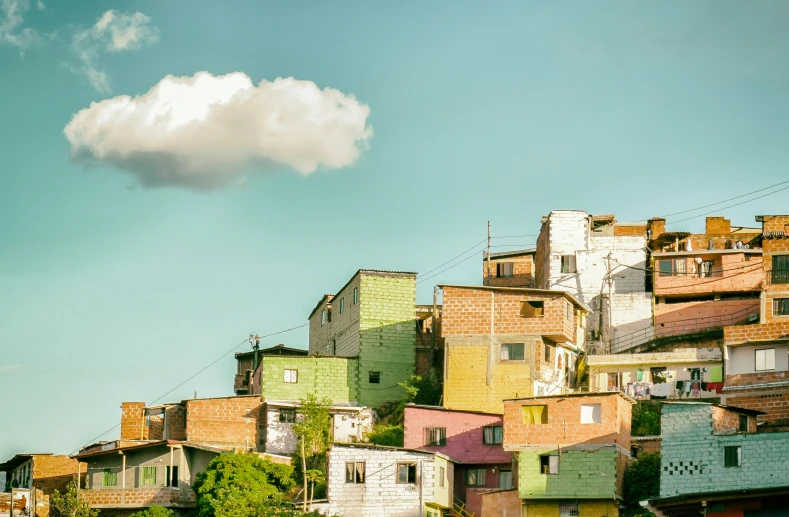 the colorful, old - fashioned houses are against the bright blue sky