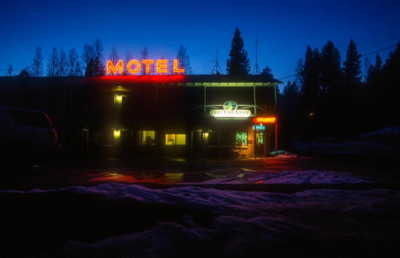 the night is dark outside the motel at night