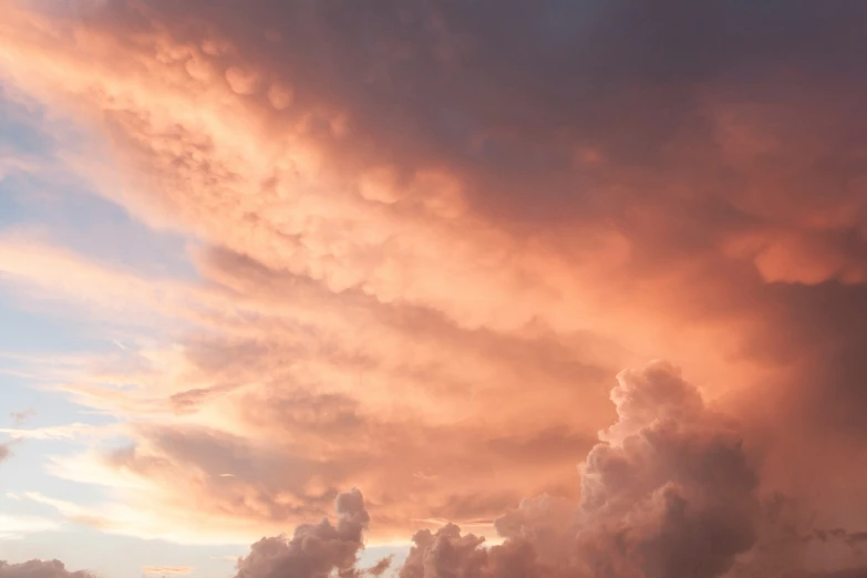 the clouds in the sky are really colorful