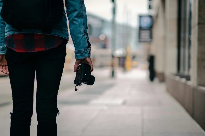 an image of a person holding a camera