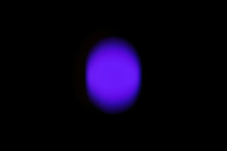 an image of a purple disk taken with a small camera