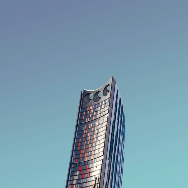 a high rise office building with colored glass windows