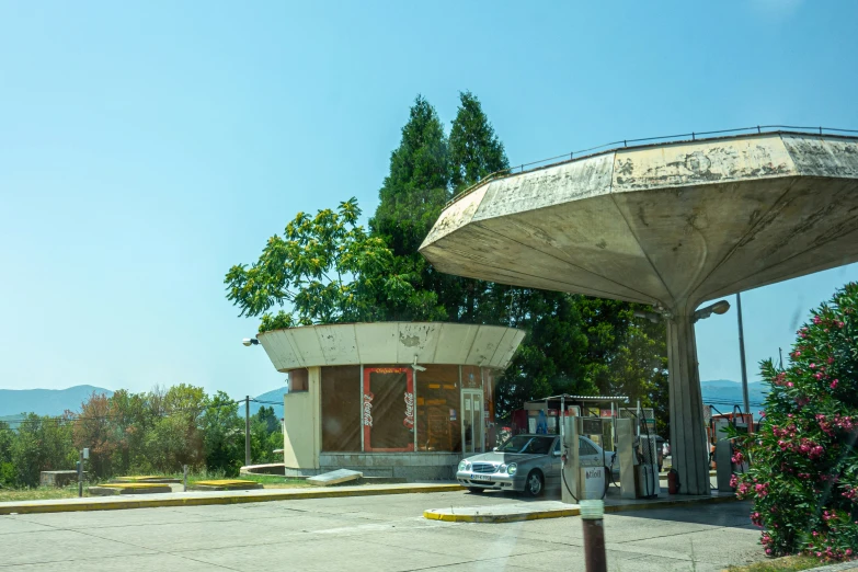 a car is parked at the gas station