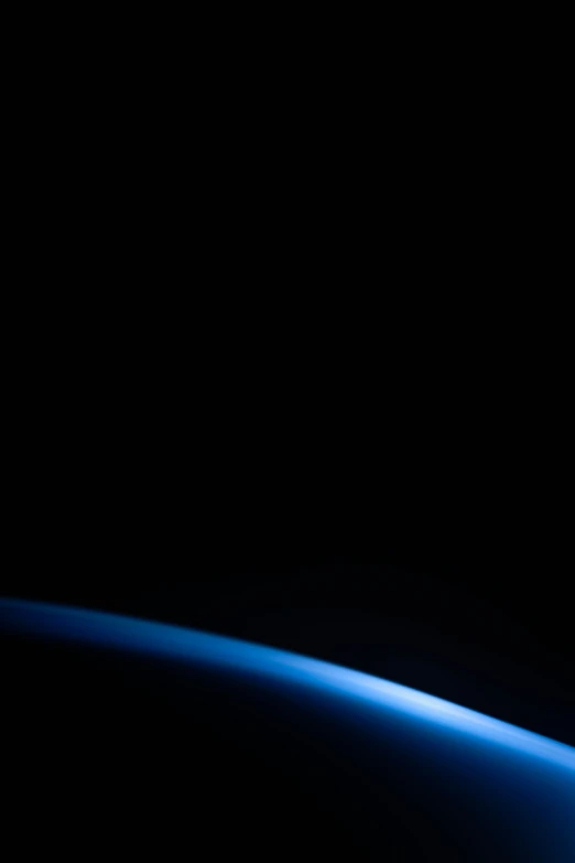 the earth as seen from space showing blue streak