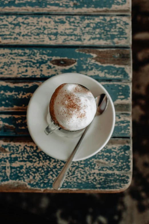 a white plate with a dessert on top of it