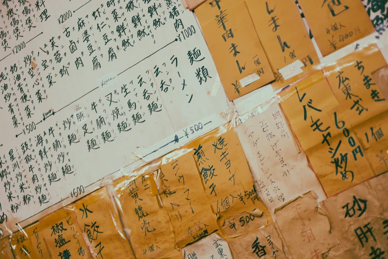 papers written in chinese and asian characters with asian calligraphy