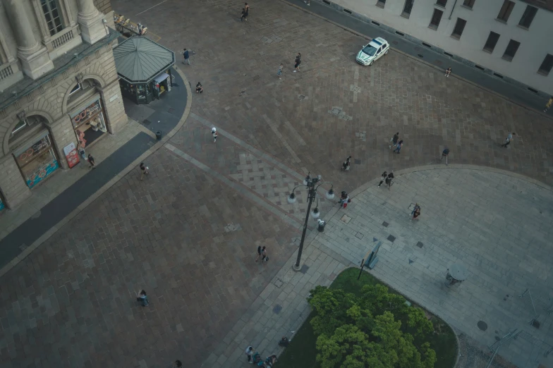 a po taken from an air plane shows people on the streets