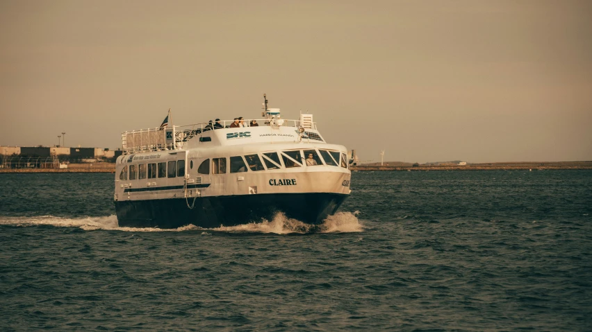 a large boat sailing across a large body of water