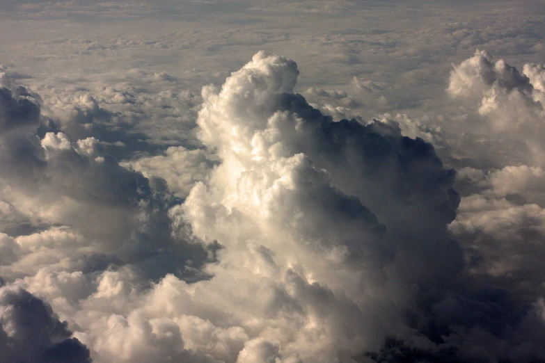 clouds in the sky, with a view from the plane