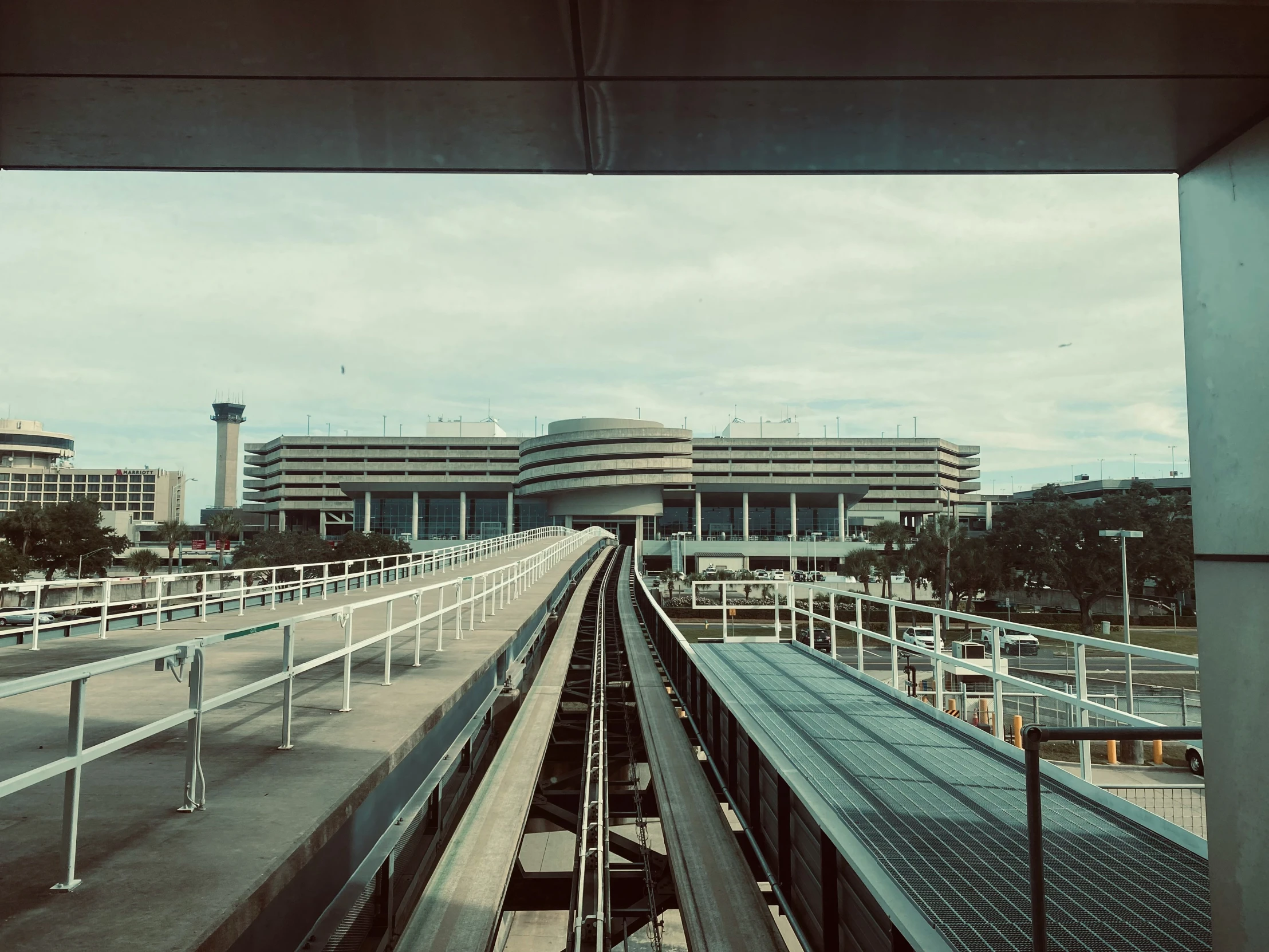 the skyline is full of buildings next to a bridge