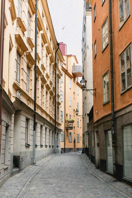 a couple of tall buildings on a street